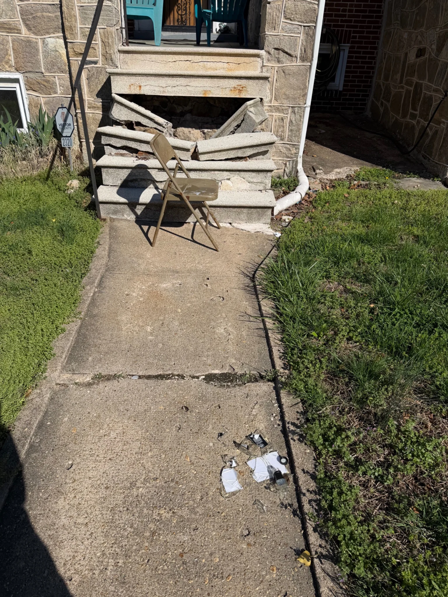 Damaged exterior concrete steps before repair