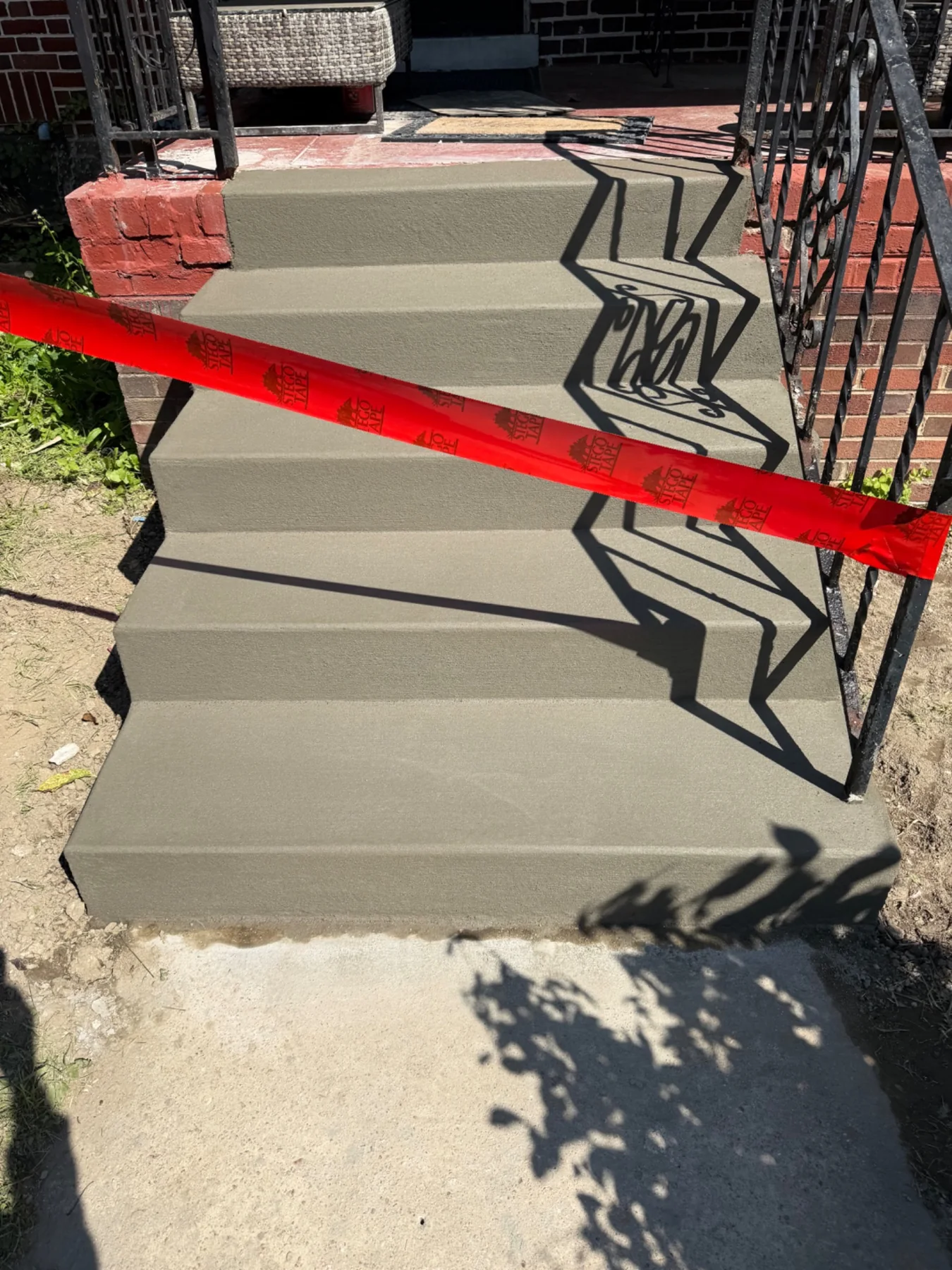 Rebuilt and resurfaced exterior concrete steps after repair